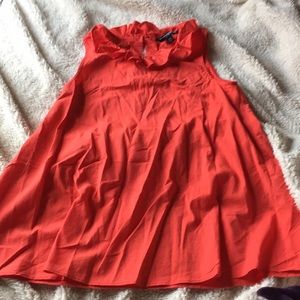 red sleeveless top